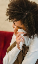 Young Black mother in a quiet, tearful moment